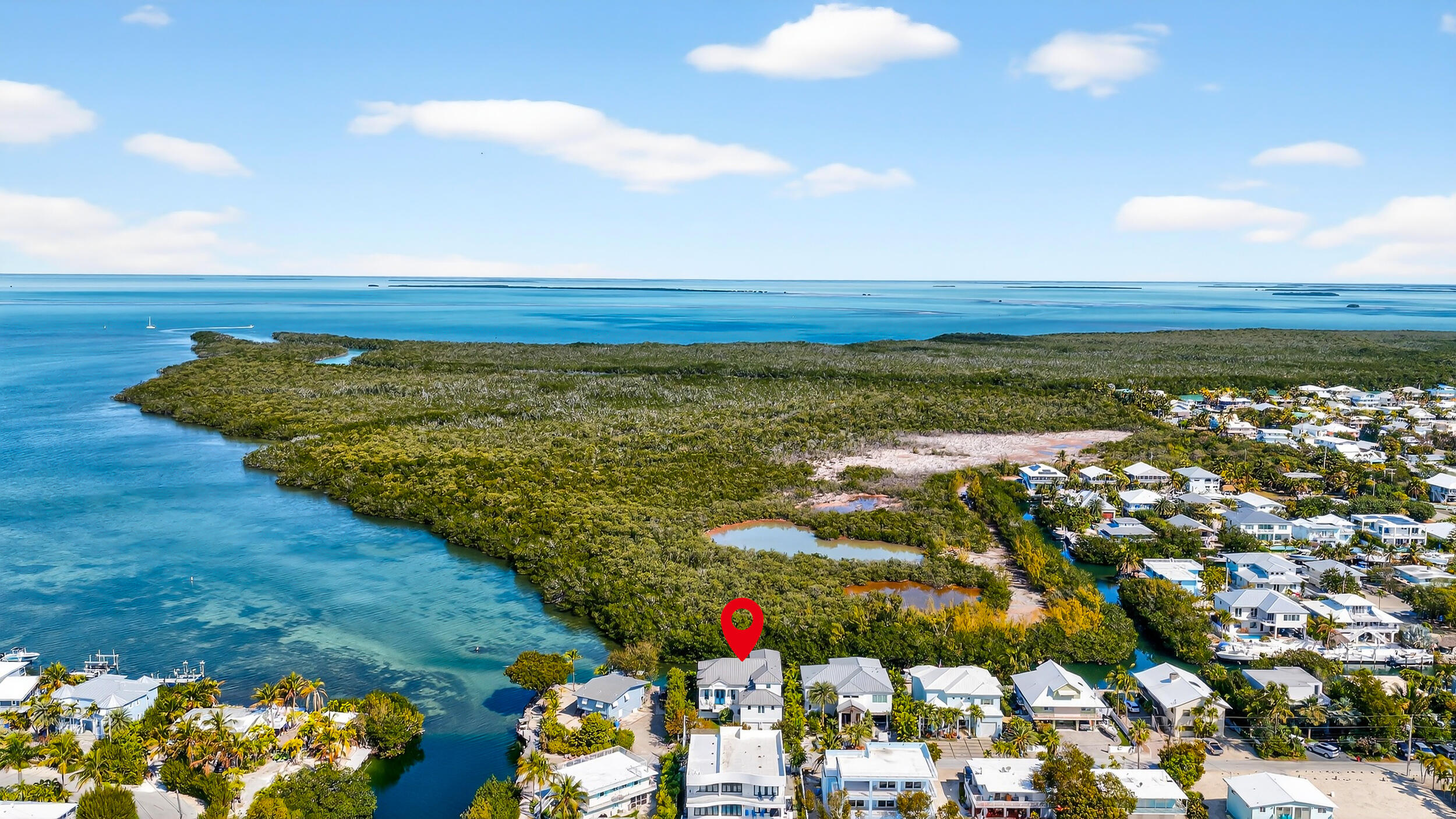 146 Mockingbird Road Tavernier, FL 33070 - Photo 1 of 52 2_dji_20260225104150_0030_d-edit