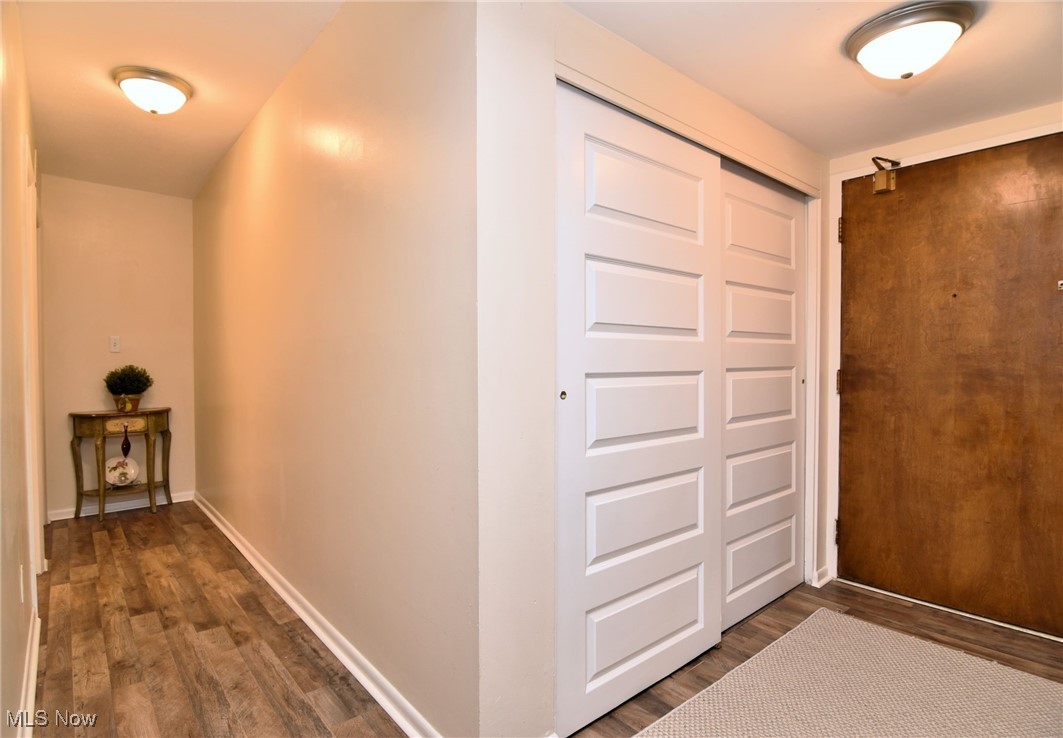 1105 Canyon View Road, Unit 602 Northfield, OH 44067 - Photo 18 of 31 Hallway with dark hardwood / wood-style flooring