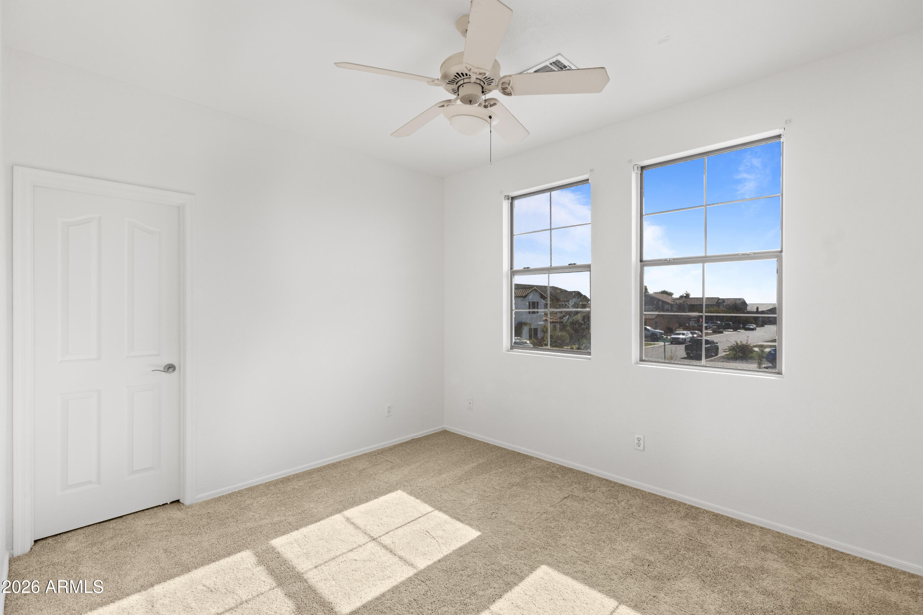 9840 Tangerine Road Florence, AZ 85132 - Photo 24 of 38 a view of an empty room with a window