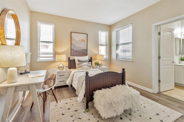 907 Rancho Place San Jose, CA 95126 - Photo 19 of 31 a bedroom with a bed and wooden floor