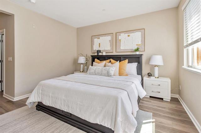 907 Rancho Place San Jose, CA 95126 - Photo 23 of 31 a bedroom with a bed and window