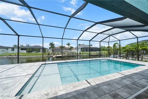 a view of a swimming pool with a porch