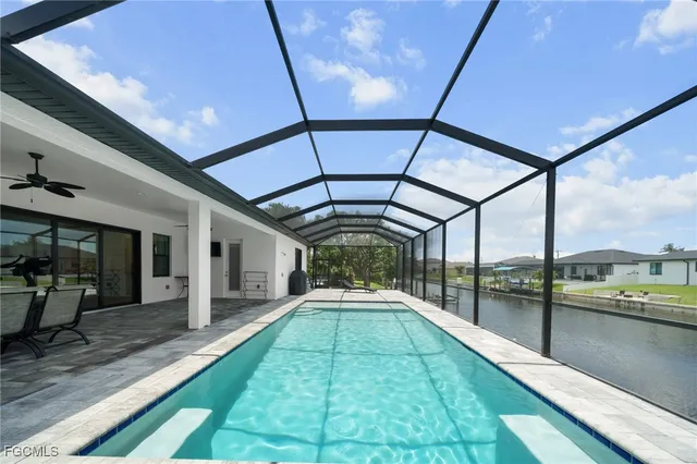 a view of a swimming pool with a balcony