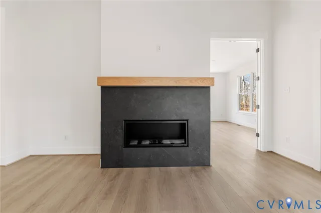 a living room with a fireplace
