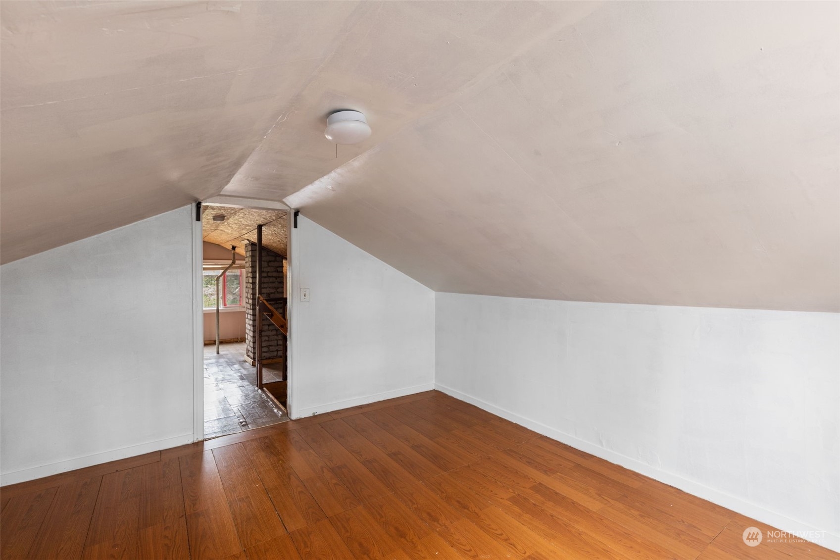 666 Sunset Boulevard Northeast Renton, WA 98056 - Photo 25 of 39 a view of empty room with wooden floor