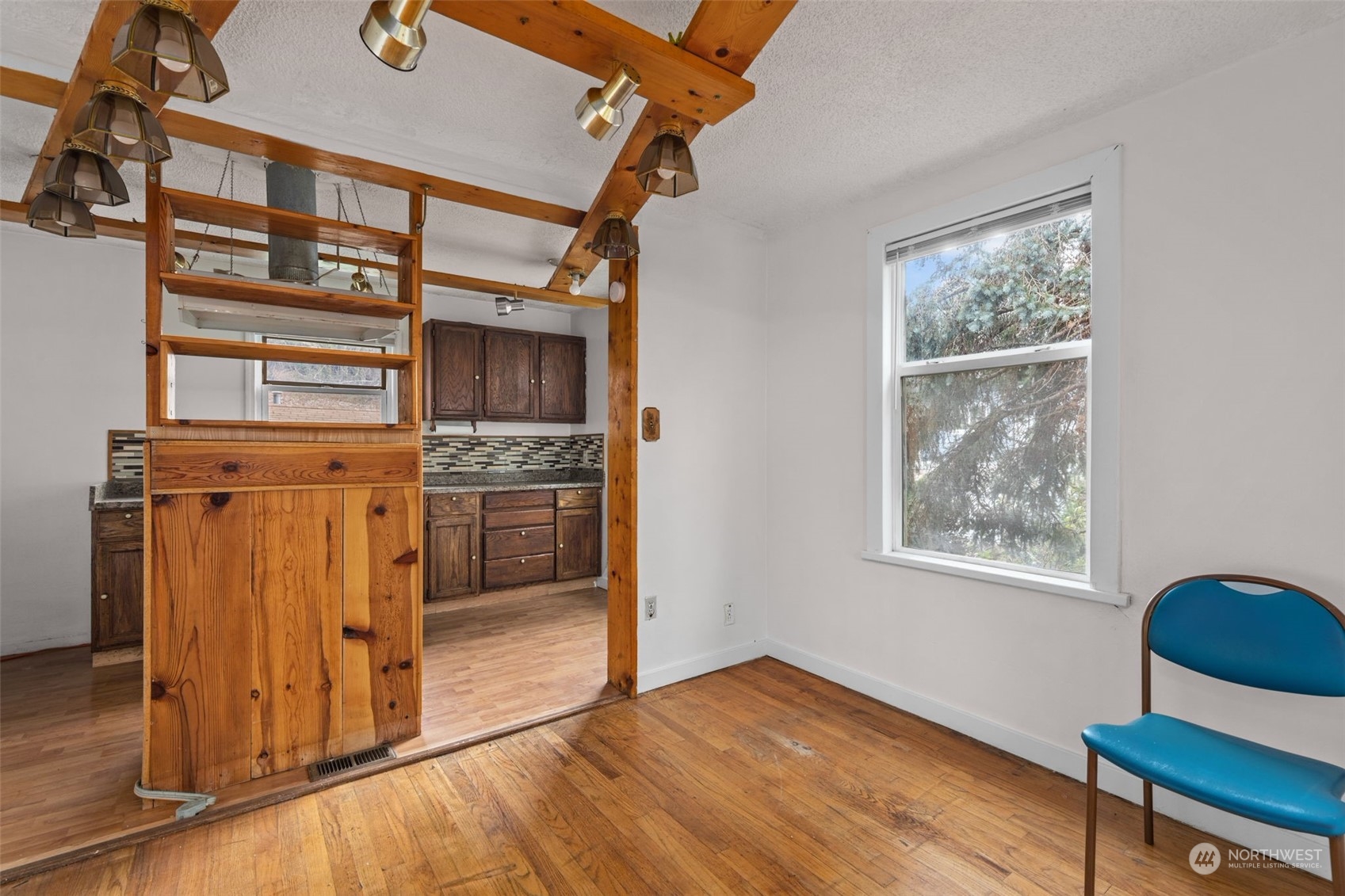 666 Sunset Boulevard Northeast Renton, WA 98056 - Photo 8 of 39 a view of kitchen with furniture and a window