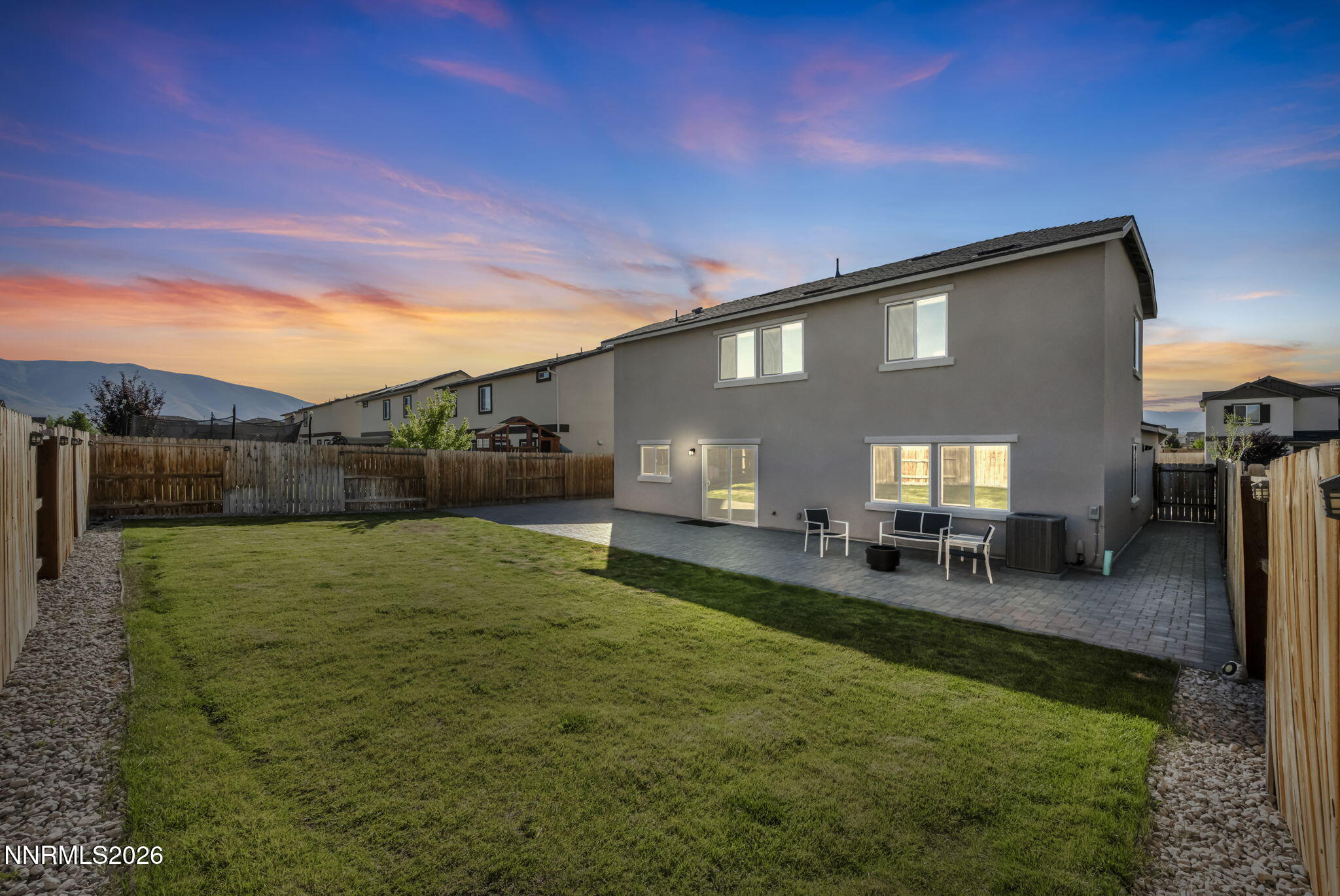 8850 Finnsech Drive Reno, NV 89506 - Photo 15 of 56 a backyard of a house with table and chairs