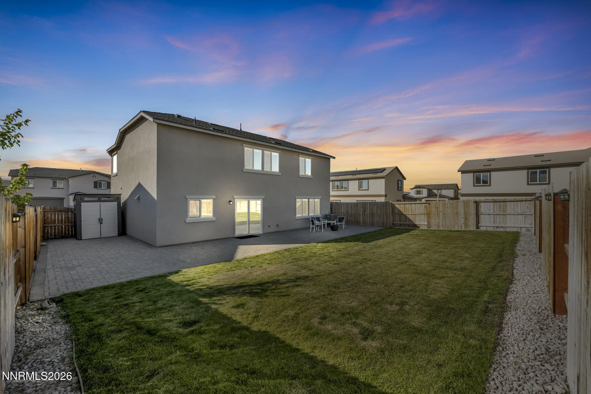 8850 Finnsech Drive Reno, NV 89506 - Photo 17 of 56 a front view of a house with a yard
