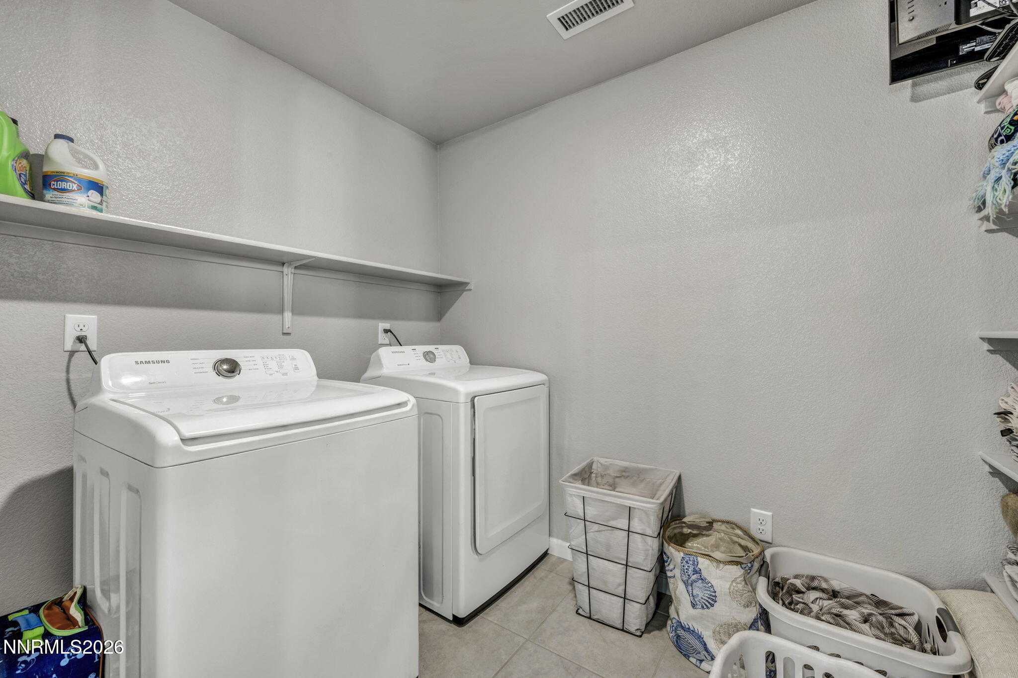 8850 Finnsech Drive Reno, NV 89506 - Photo 20 of 56 a utility room with dryer and washer