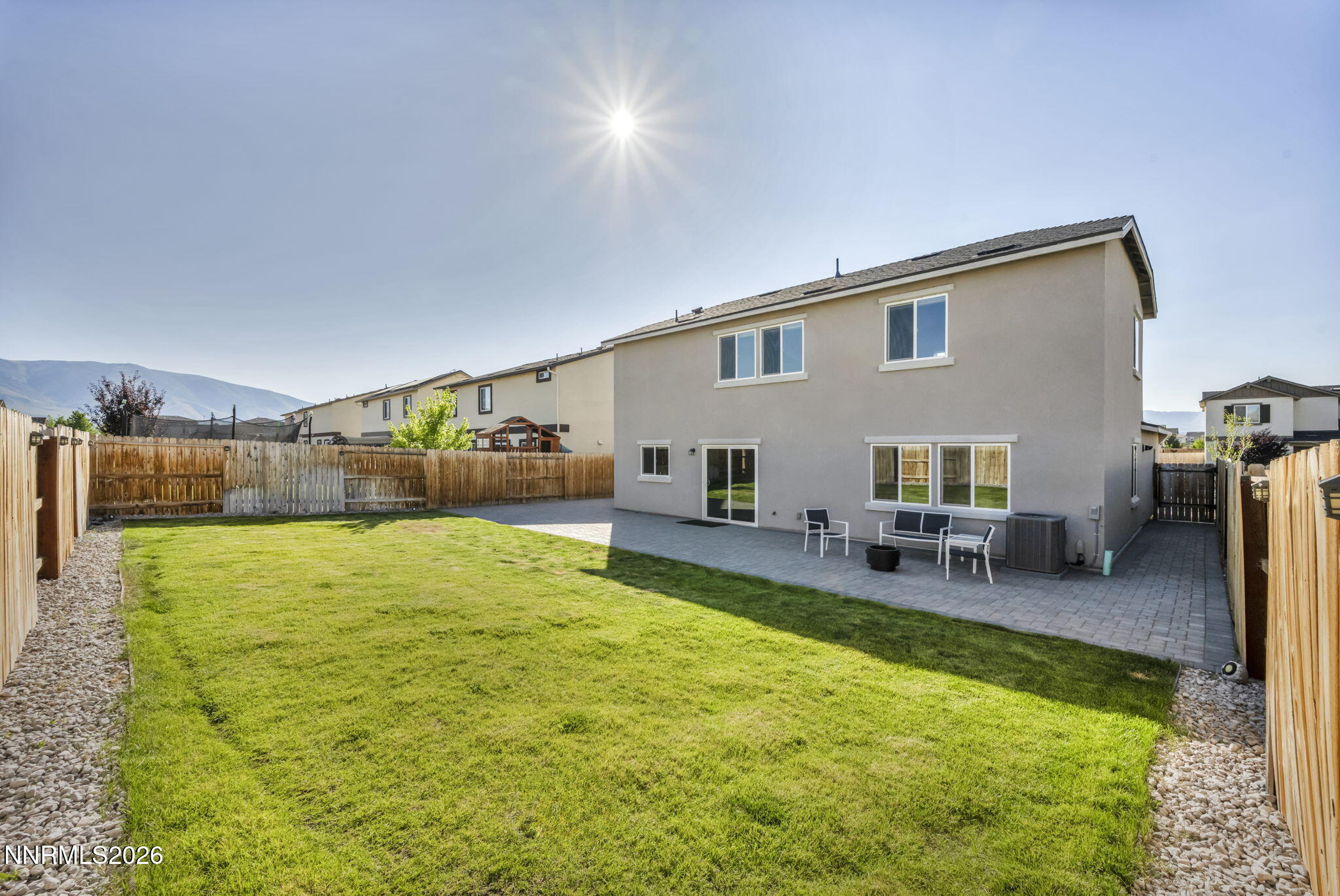 8850 Finnsech Drive Reno, NV 89506 - Photo 30 of 56 a swimming pool with outdoor seating and patio