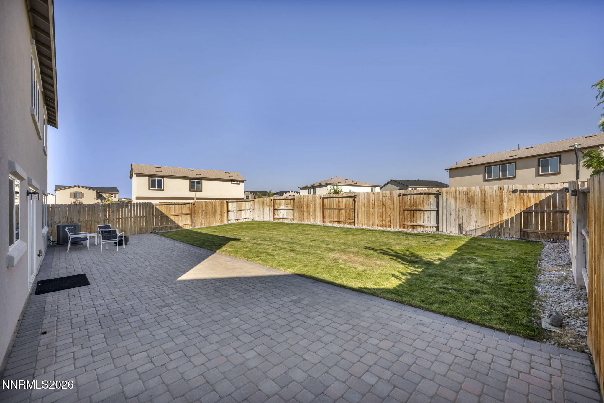 8850 Finnsech Drive Reno, NV 89506 - Photo 33 of 56 a view of an house with swimming pool yard and outdoor seating