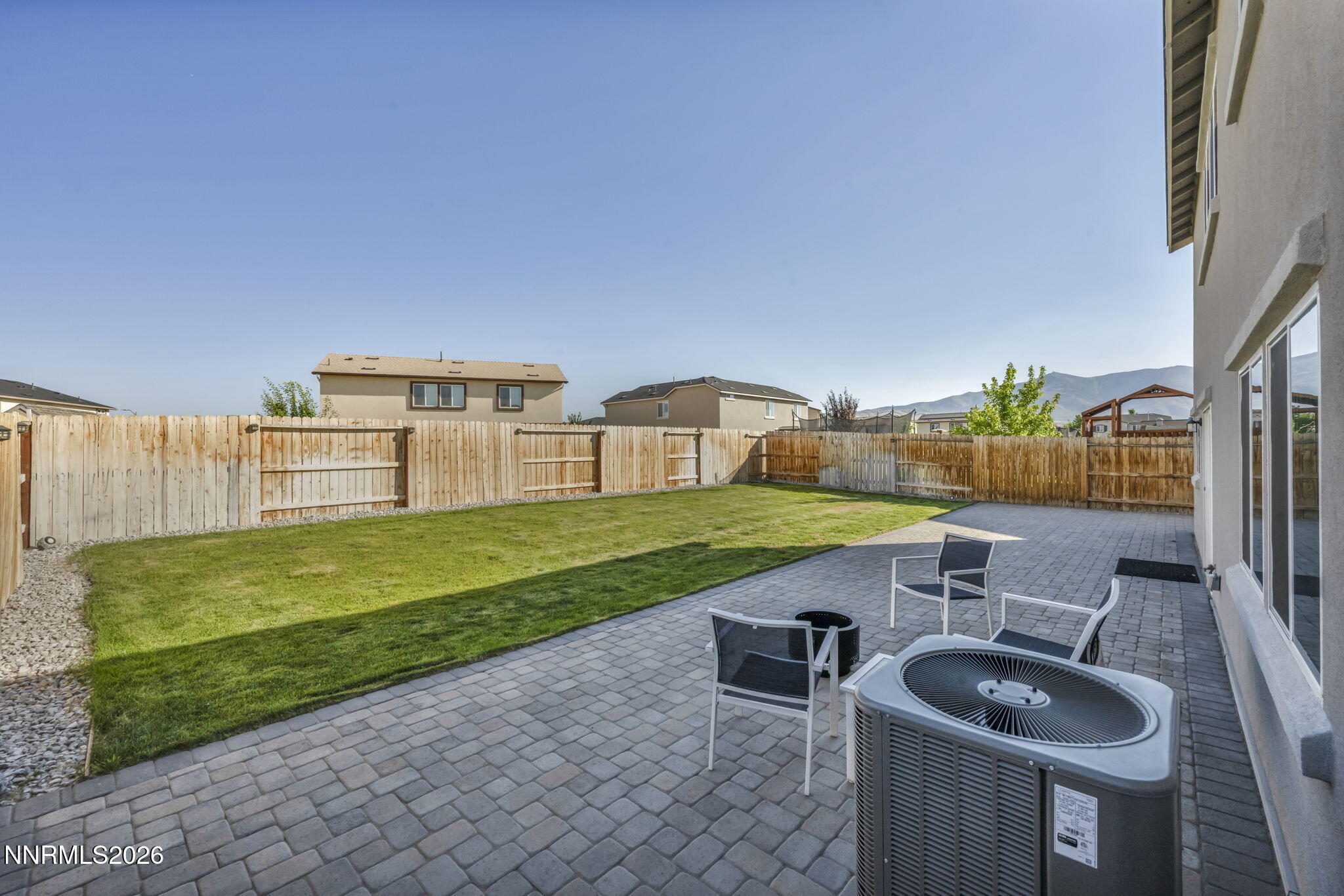 8850 Finnsech Drive Reno, NV 89506 - Photo 34 of 56 a view of a house with backyard and porch