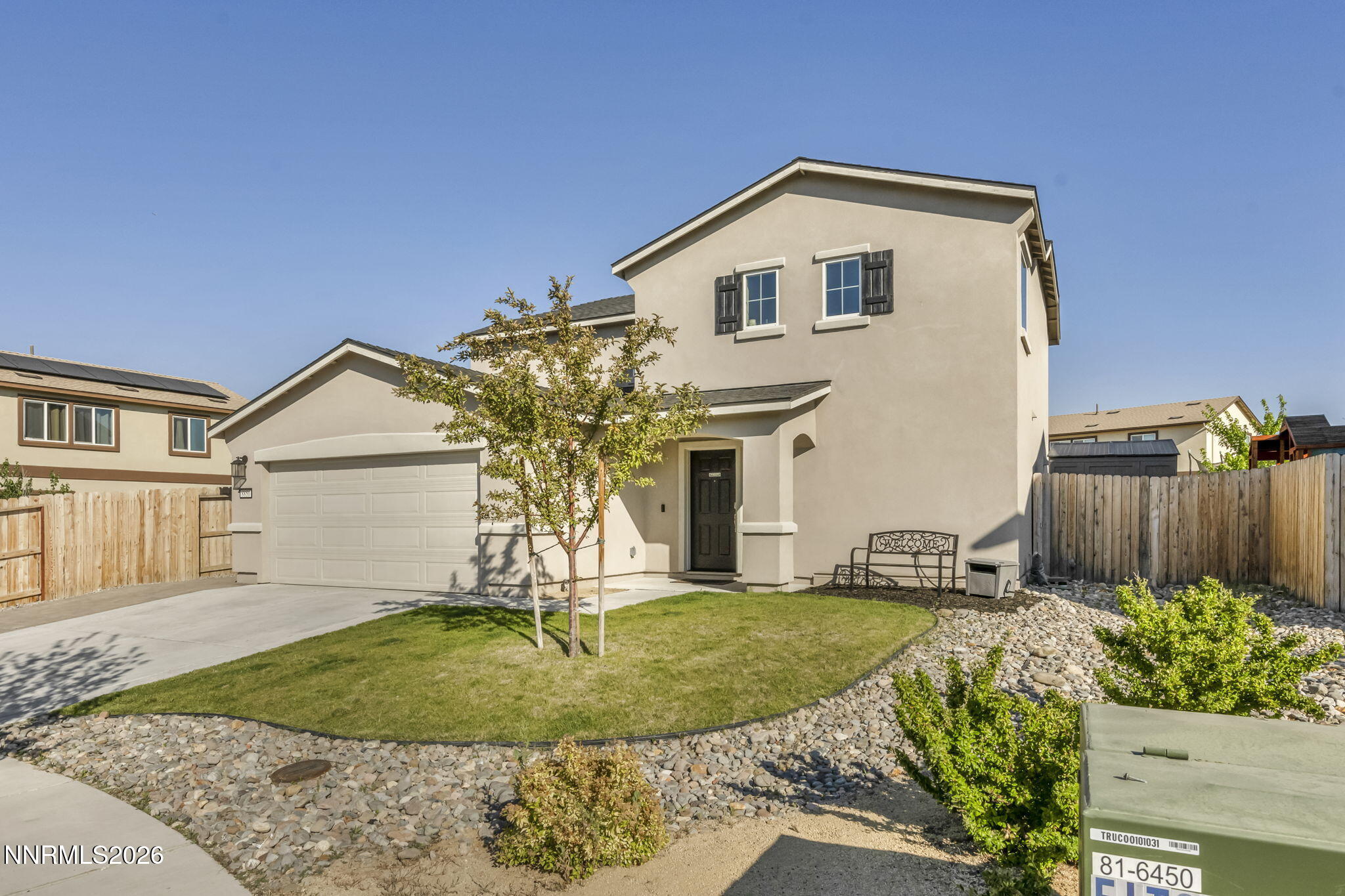 8850 Finnsech Drive Reno, NV 89506 - Photo 40 of 56 a front view of a house with a yard