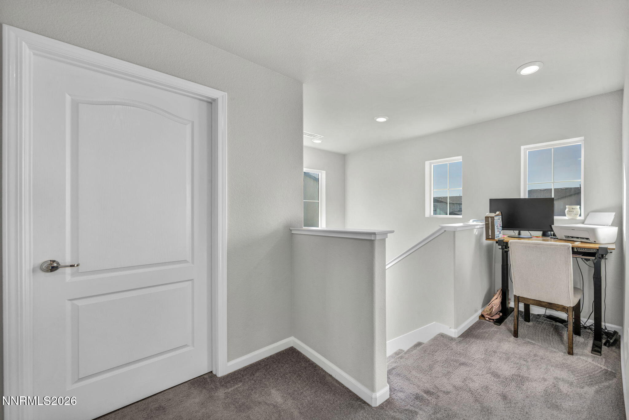 8850 Finnsech Drive Reno, NV 89506 - Photo 55 of 56 a view of a workspace with furniture and a window