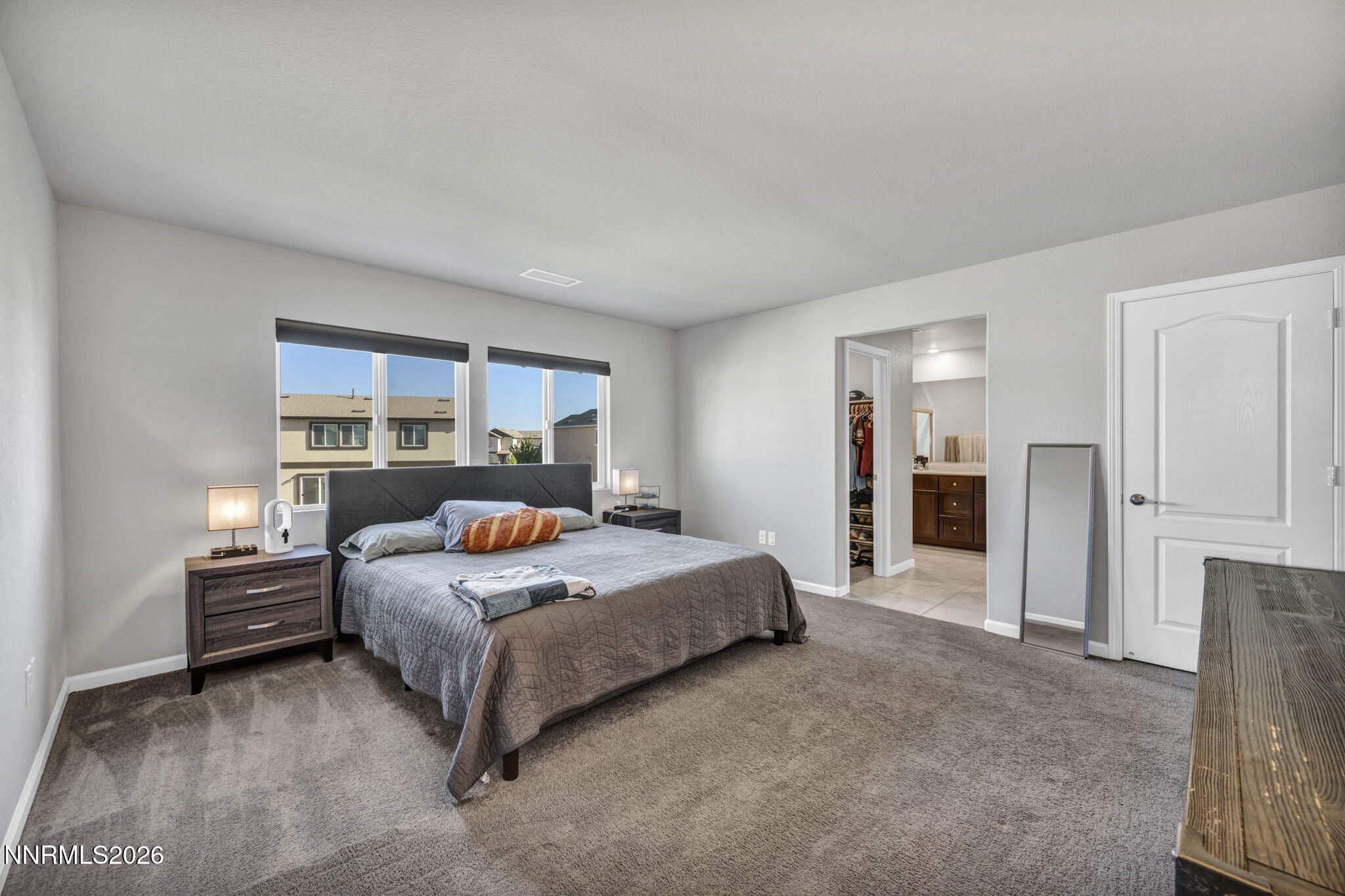 8850 Finnsech Drive Reno, NV 89506 - Photo 10 of 56 a bedroom with a bed and dresser