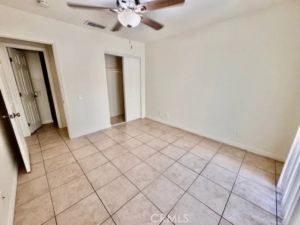 a utility room with cabinets washer and dryer