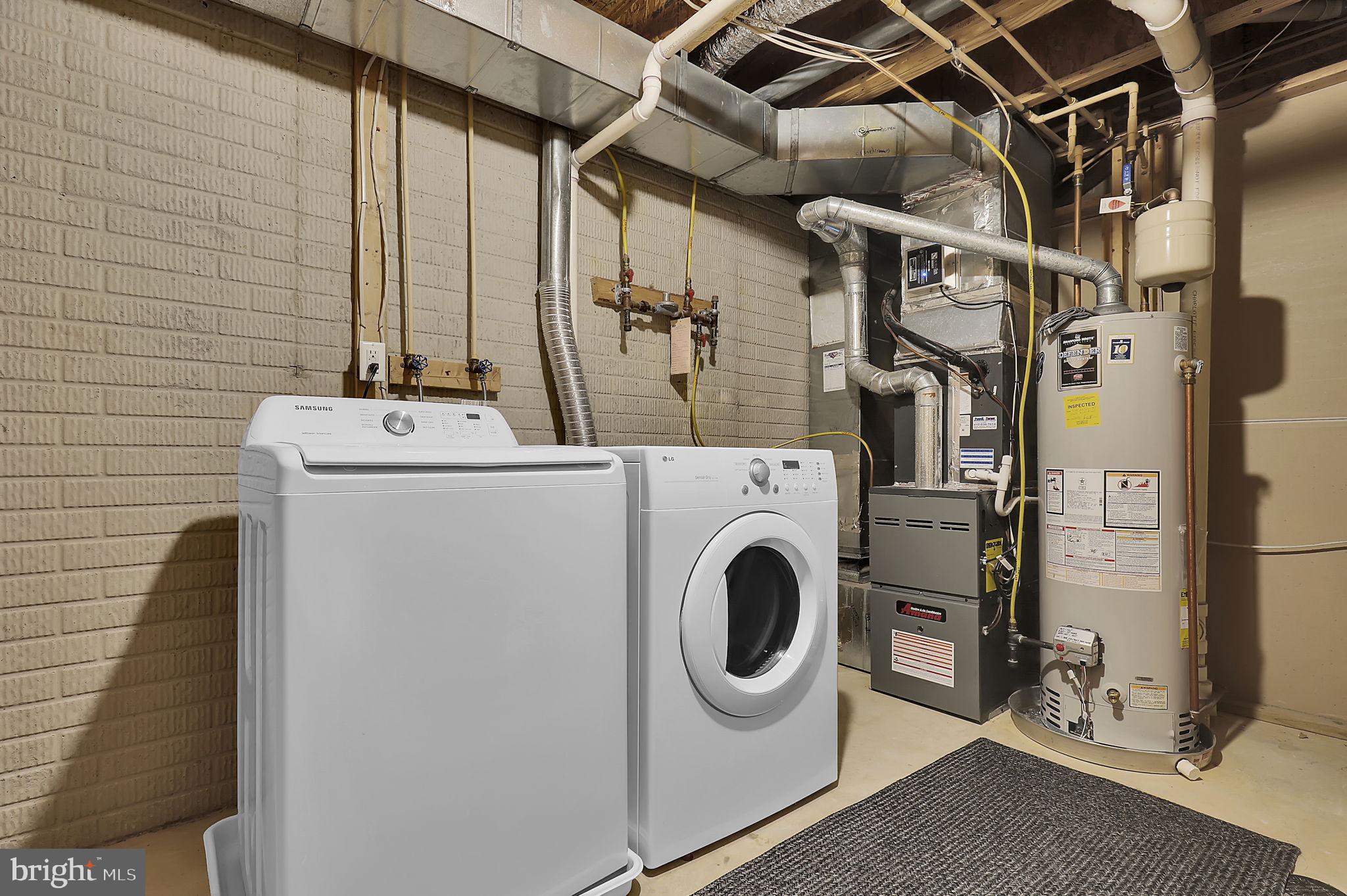 7150 Natures Road Columbia, MD 21046 - Photo 31 of 45 a utility room with dryer and washer