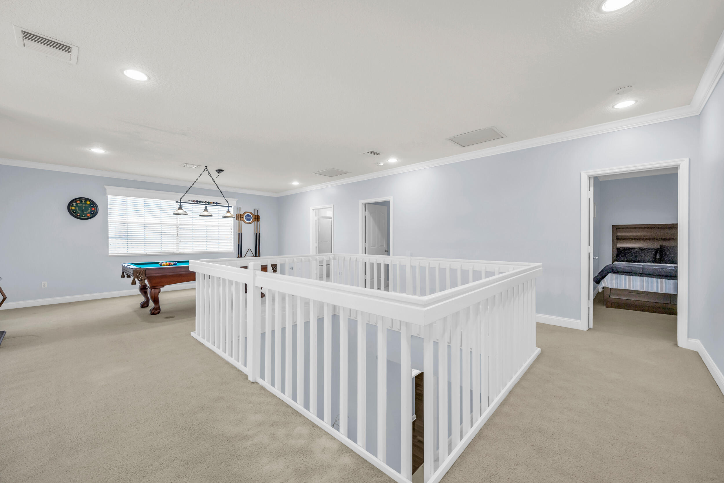 148 Cypress Cove Jupiter, FL 33458 - Photo 29 of 53 a view of a livingroom with furniture and windows