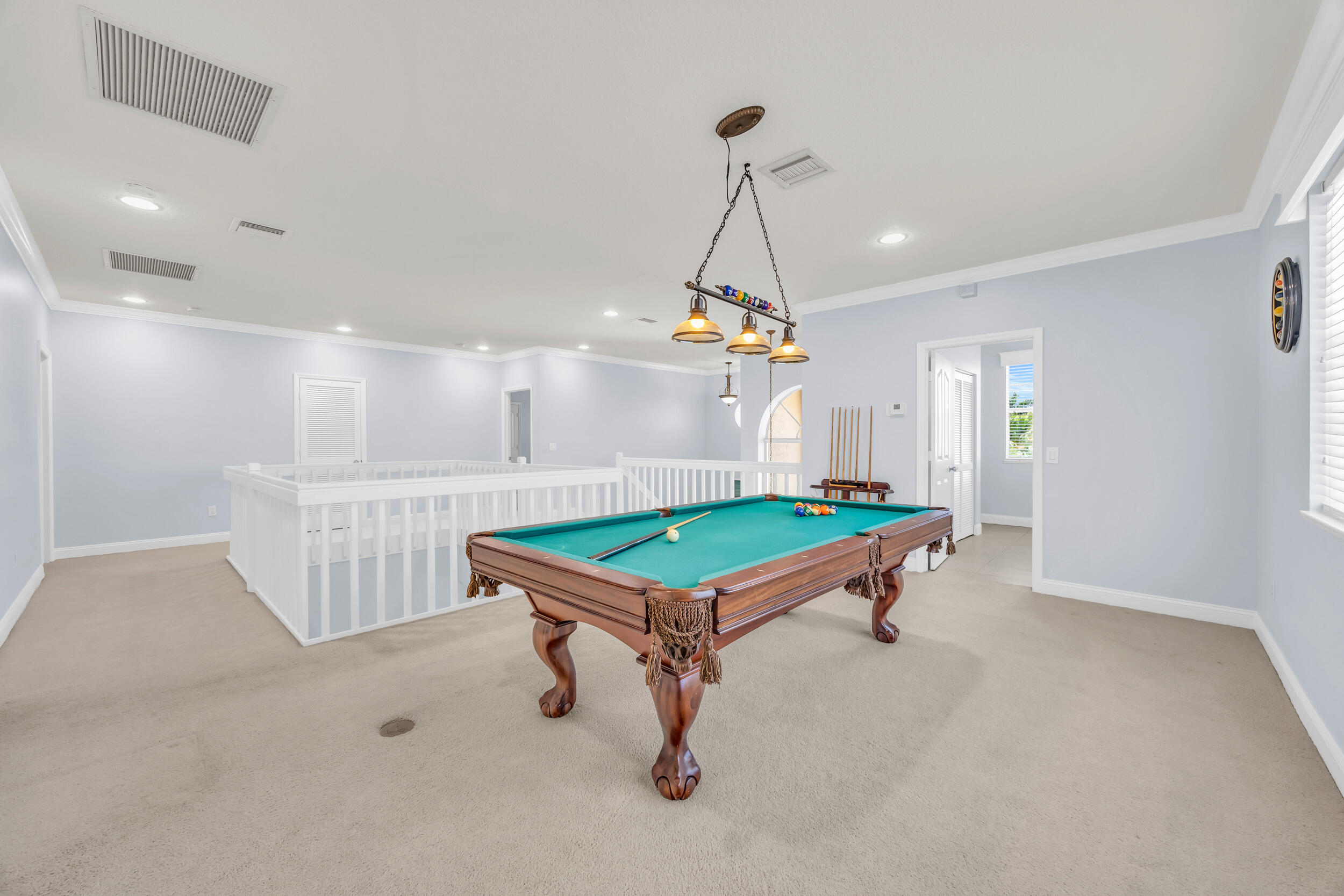 148 Cypress Cove Jupiter, FL 33458 - Photo 31 of 53 a room with pool table and windows