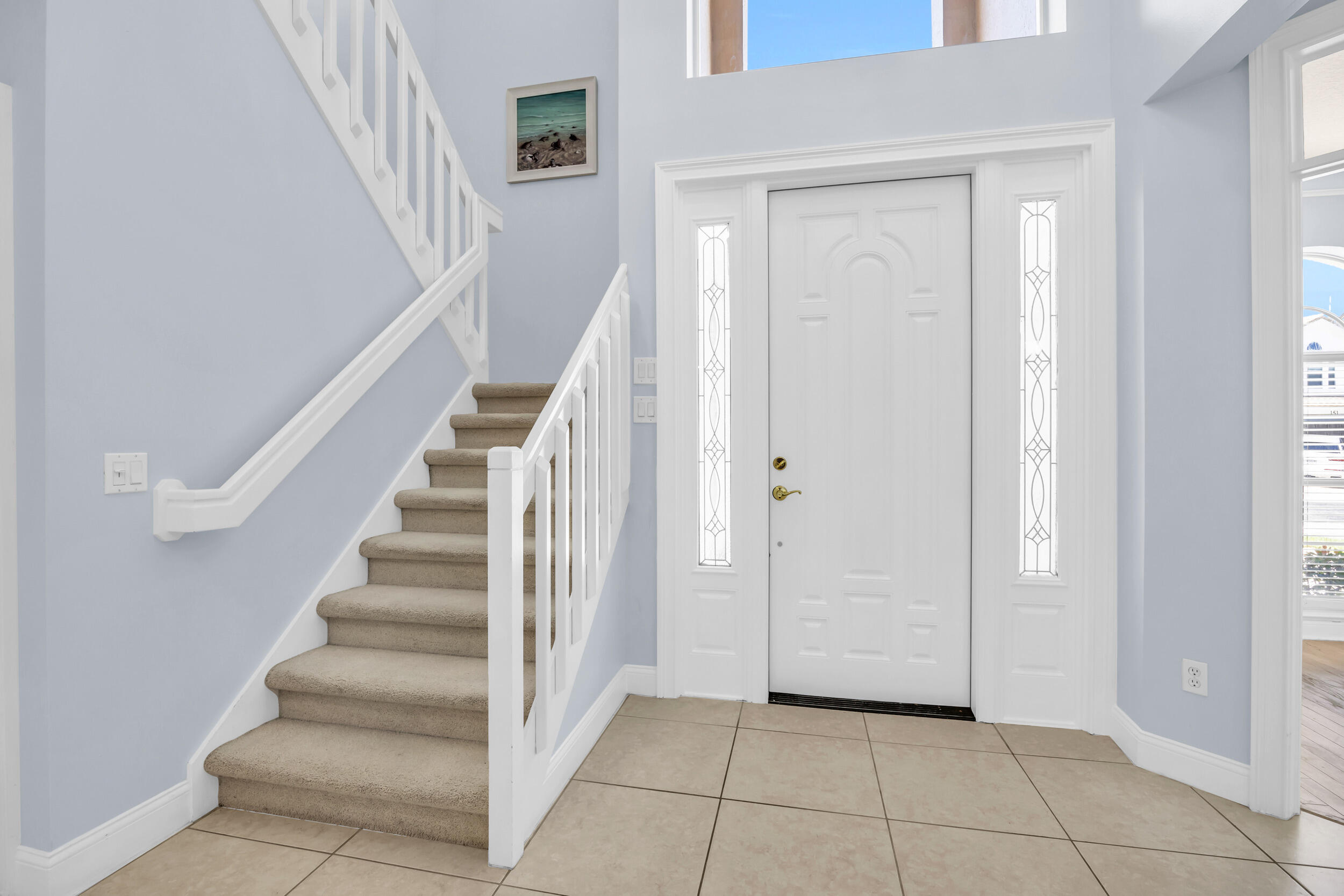 148 Cypress Cove Jupiter, FL 33458 - Photo 4 of 53 a view of an entryway with hallway