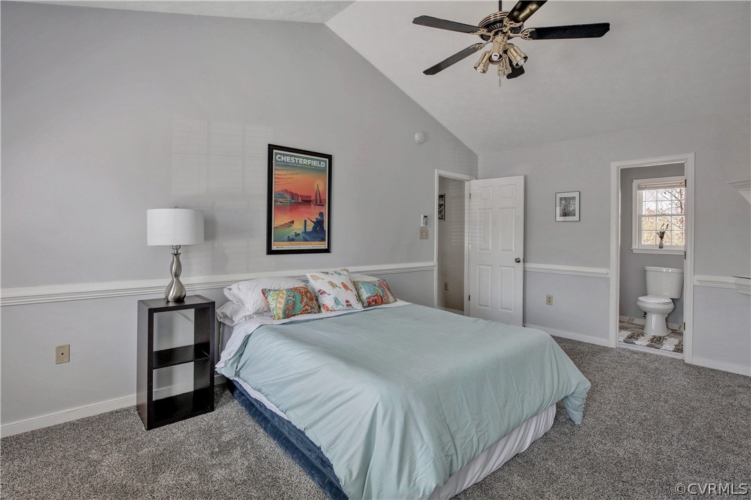2300 Brookforest Road Midlothian, VA 23112 - Photo 22 of 29 a bedroom with a bed and a chandelier