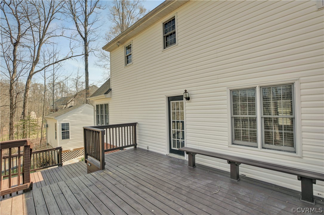 2300 Brookforest Road Midlothian, VA 23112 - Photo 26 of 29 a view of a roof deck with wooden floor and fence