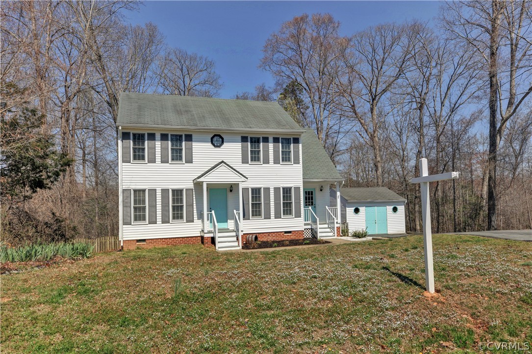 2300 Brookforest Road Midlothian, VA 23112 - Photo 3 of 29 front view of a house with a yard
