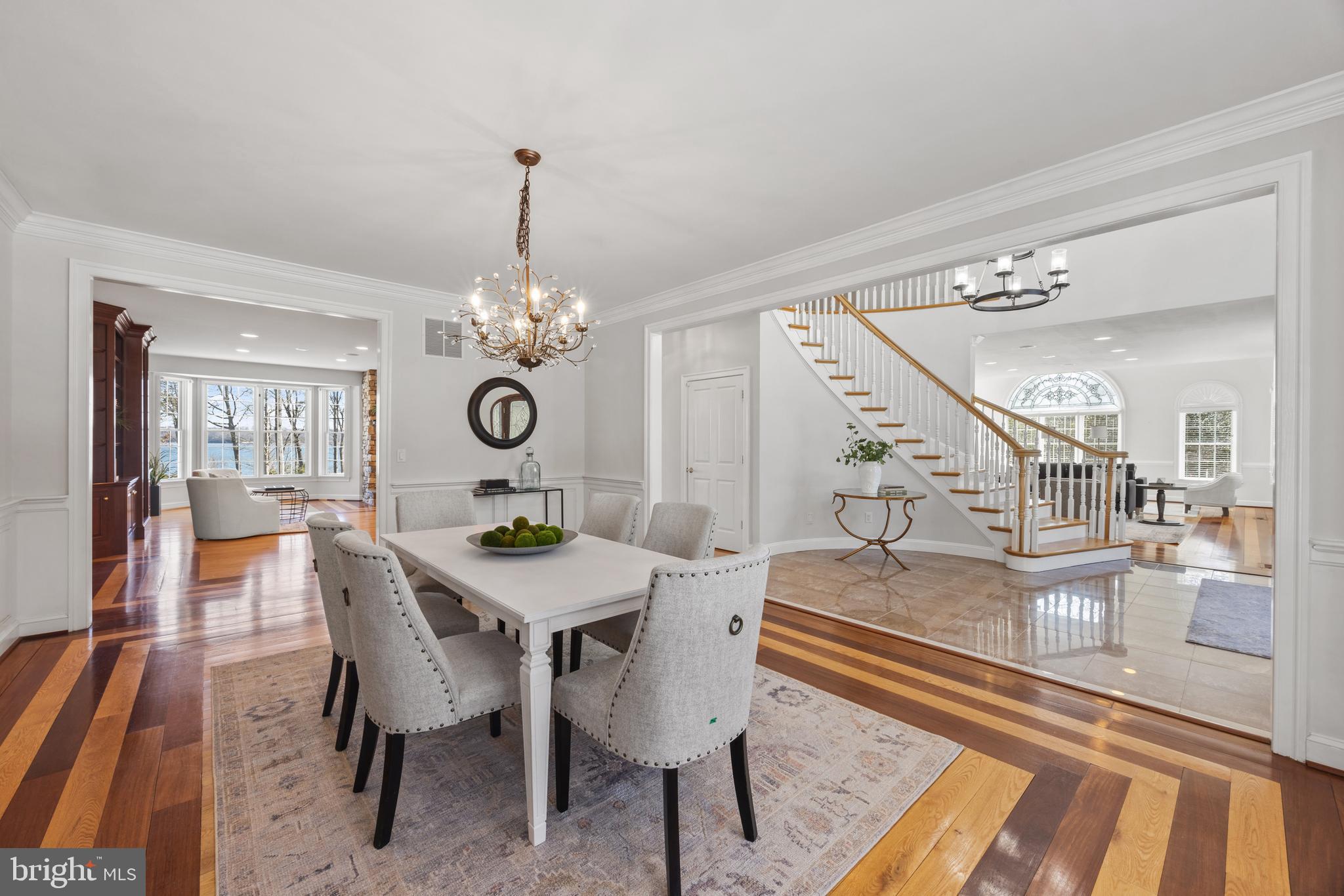 Open to foyer, living room and family room
