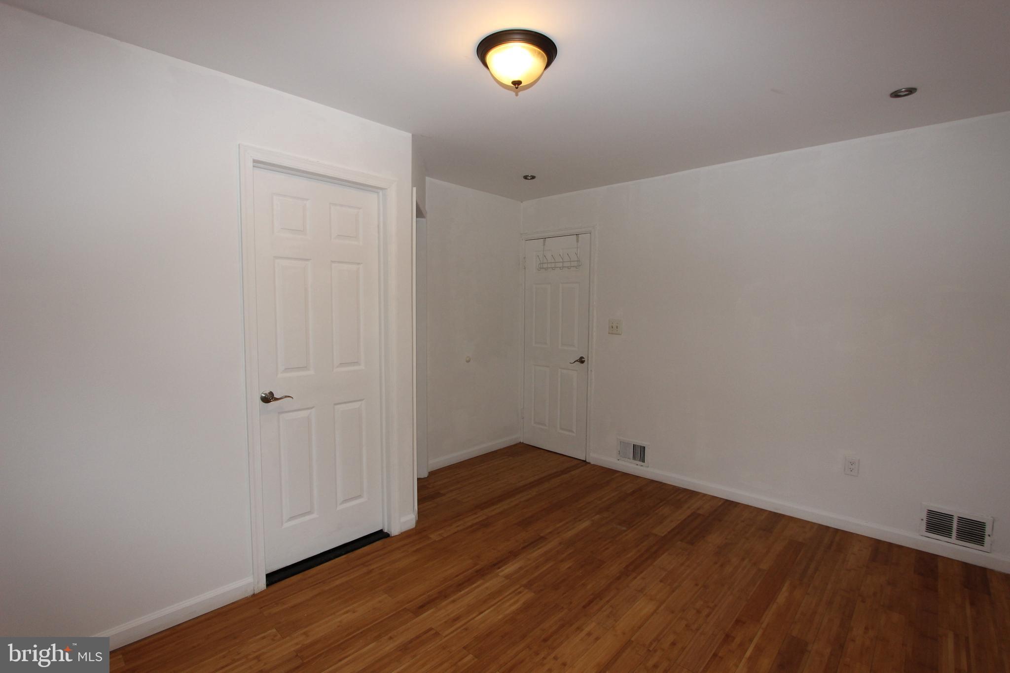 1535 K Street Southeast Washington, DC 20003 - Photo 11 of 21 a view of room with wooden floor