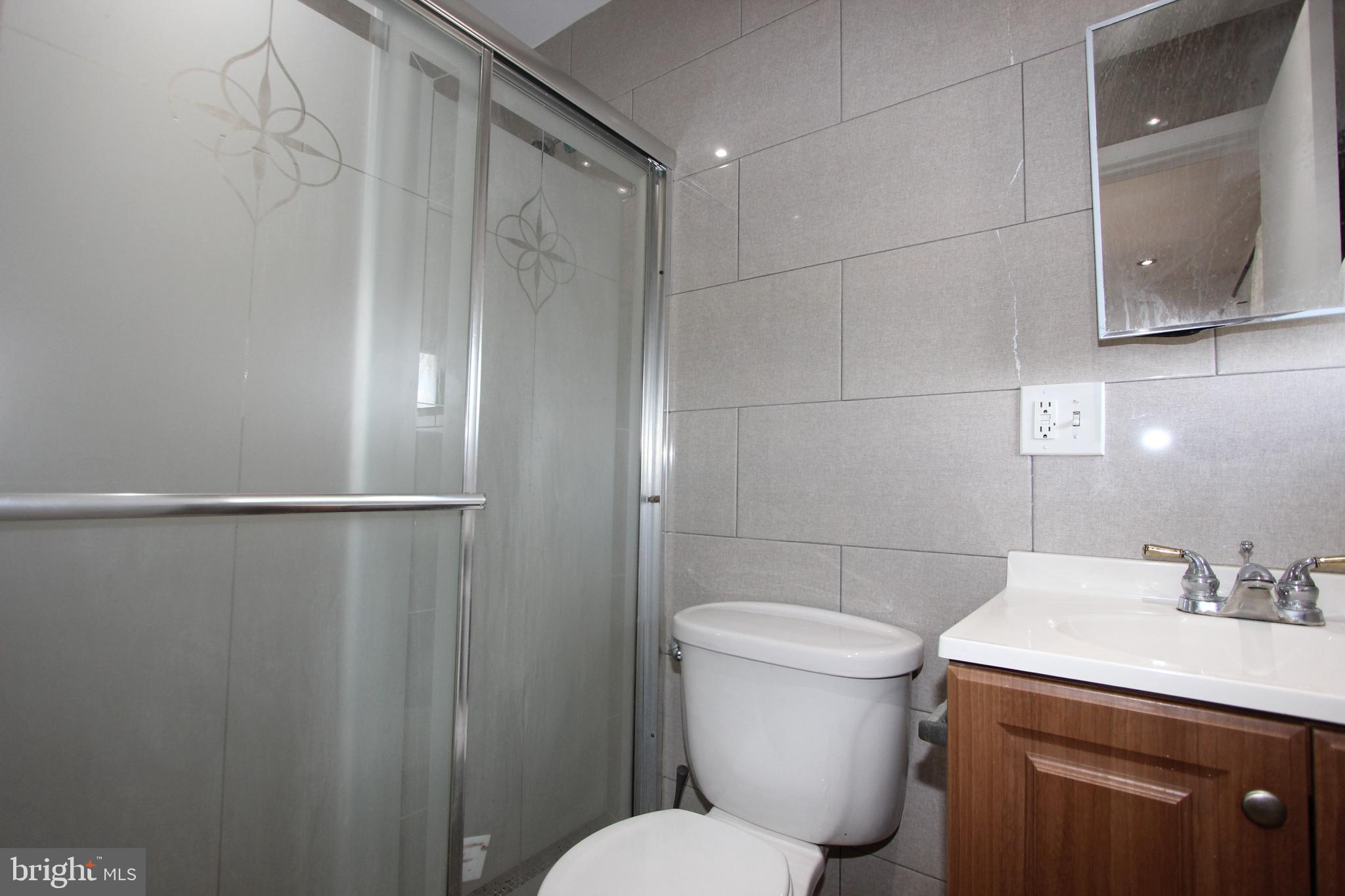 1535 K Street Southeast Washington, DC 20003 - Photo 17 of 21 a bathroom with a sink toilet and shower