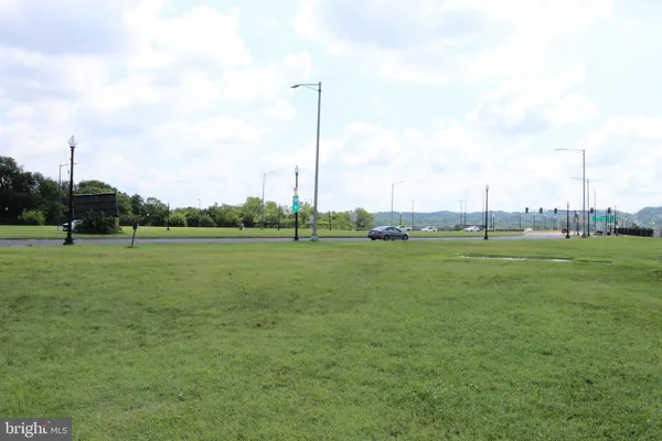 a view of a golf course with a lake