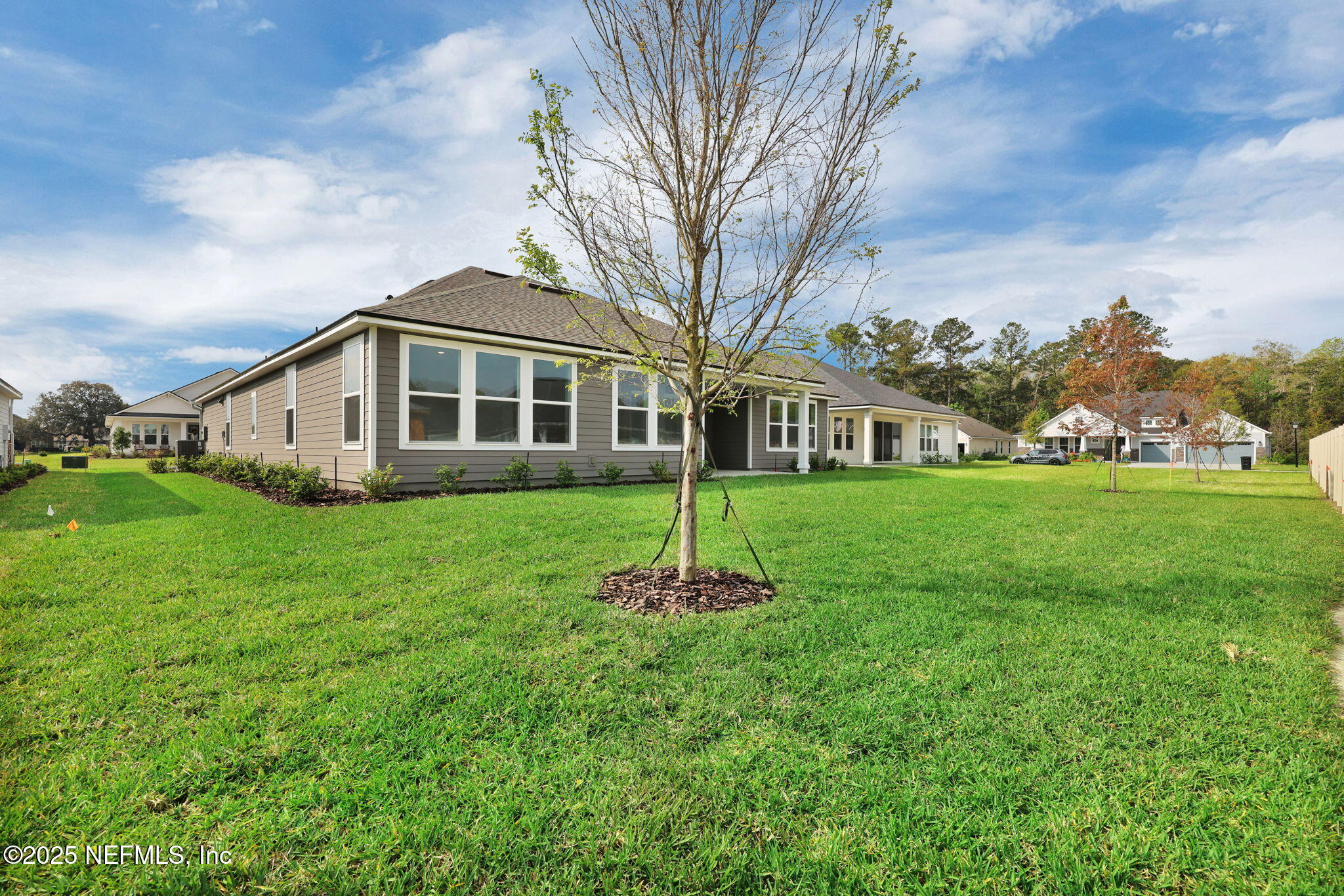 39 Greylock Lane St. Augustine, FL 32092 - Photo 12 of 54 a front view of a house with a yard