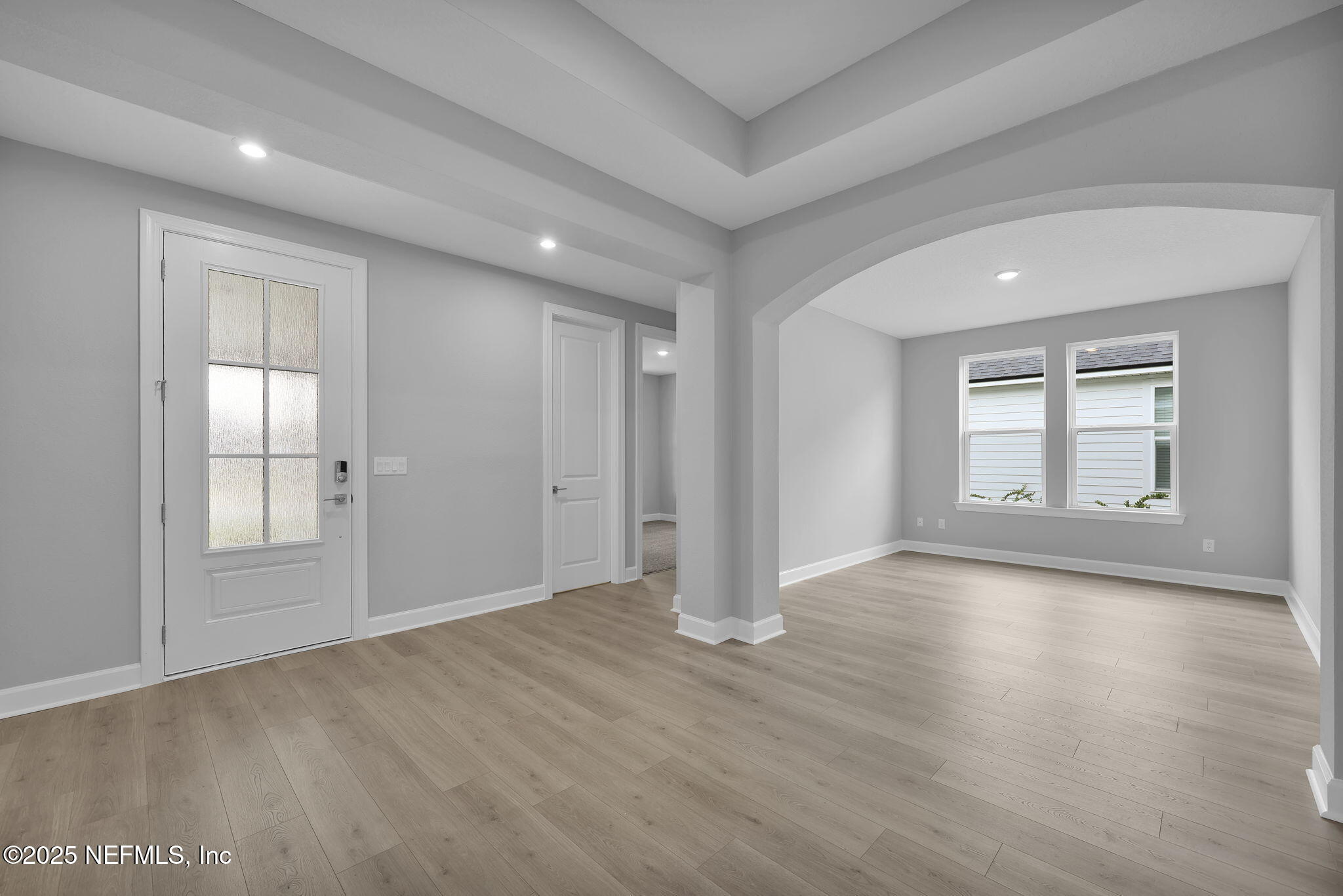 39 Greylock Lane St. Augustine, FL 32092 - Photo 15 of 54 an empty room with wooden floor and windows