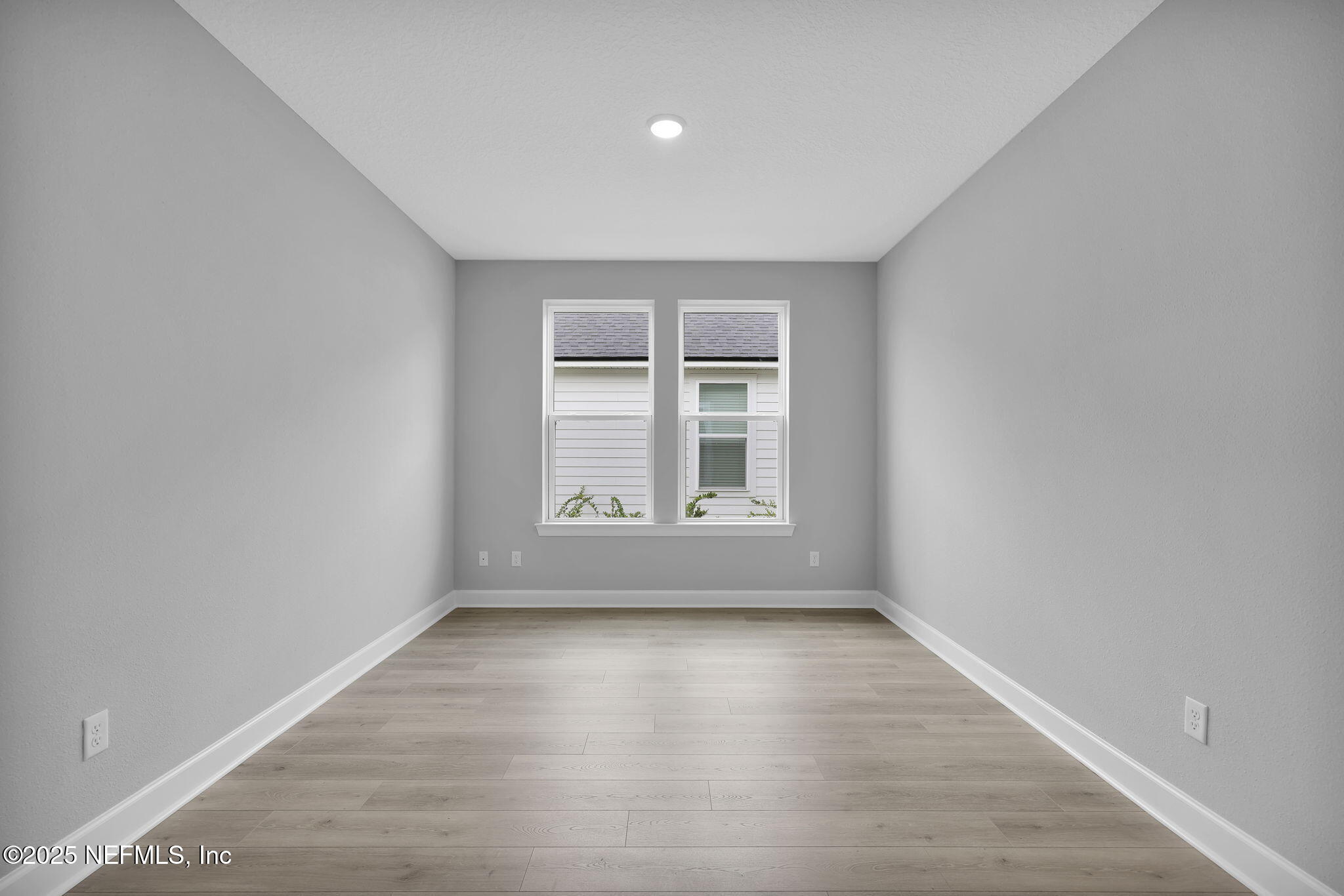 39 Greylock Lane St. Augustine, FL 32092 - Photo 17 of 54 wooden floor in an empty room with a window