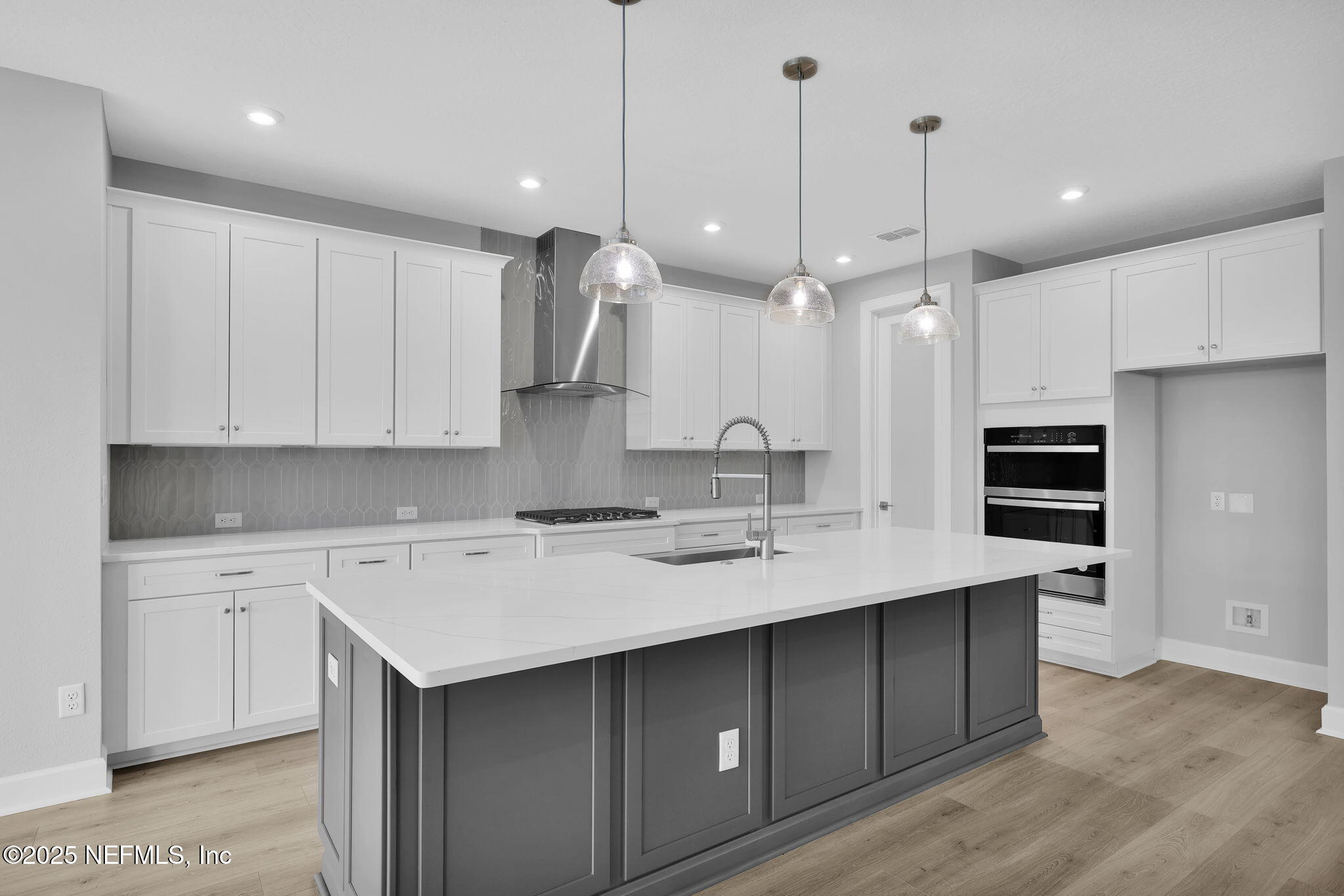 39 Greylock Lane St. Augustine, FL 32092 - Photo 22 of 54 a kitchen with a sink stainless steel appliances and cabinets