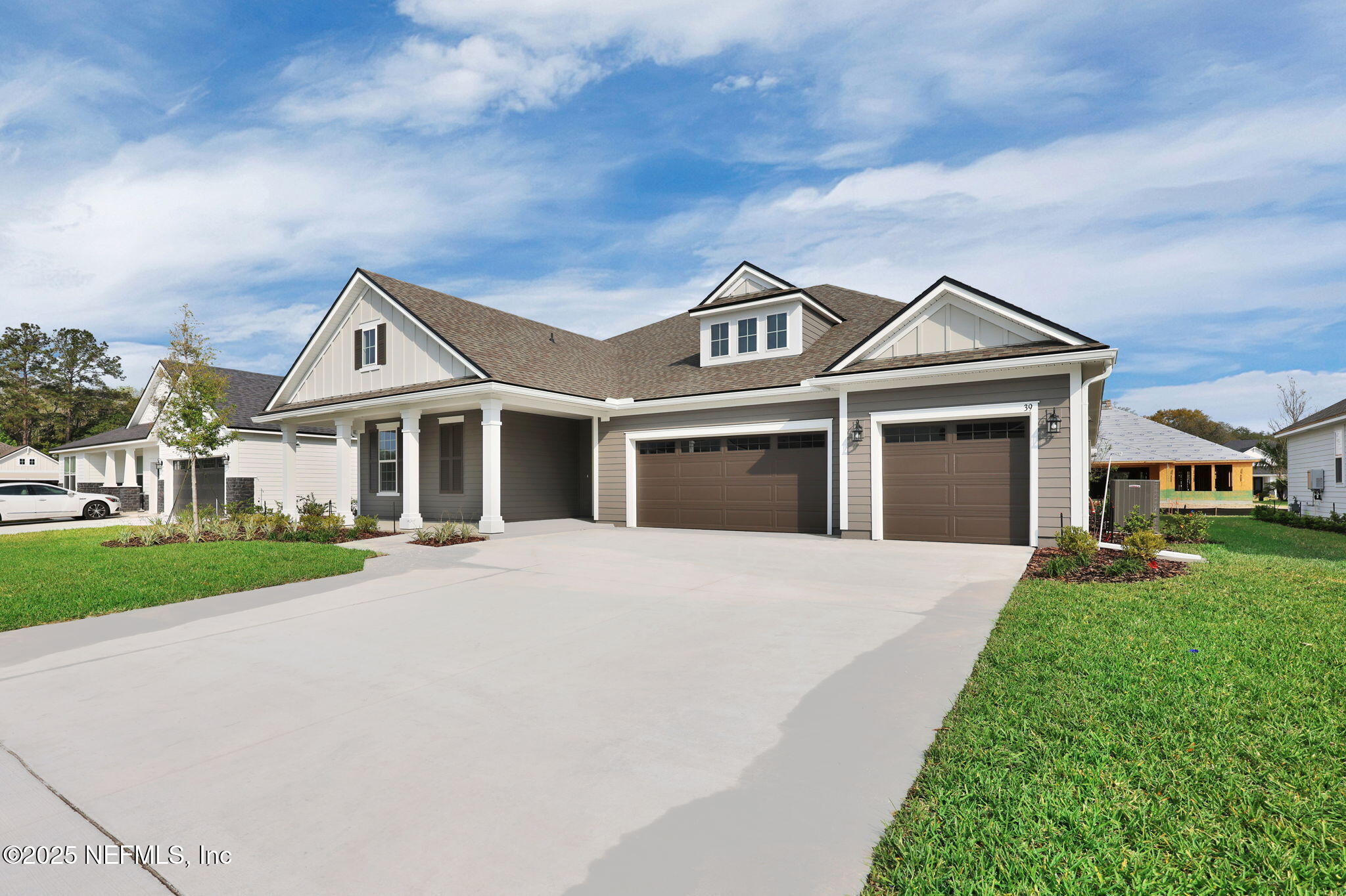 39 Greylock Lane St. Augustine, FL 32092 - Photo 3 of 54 front view of a house with a yard