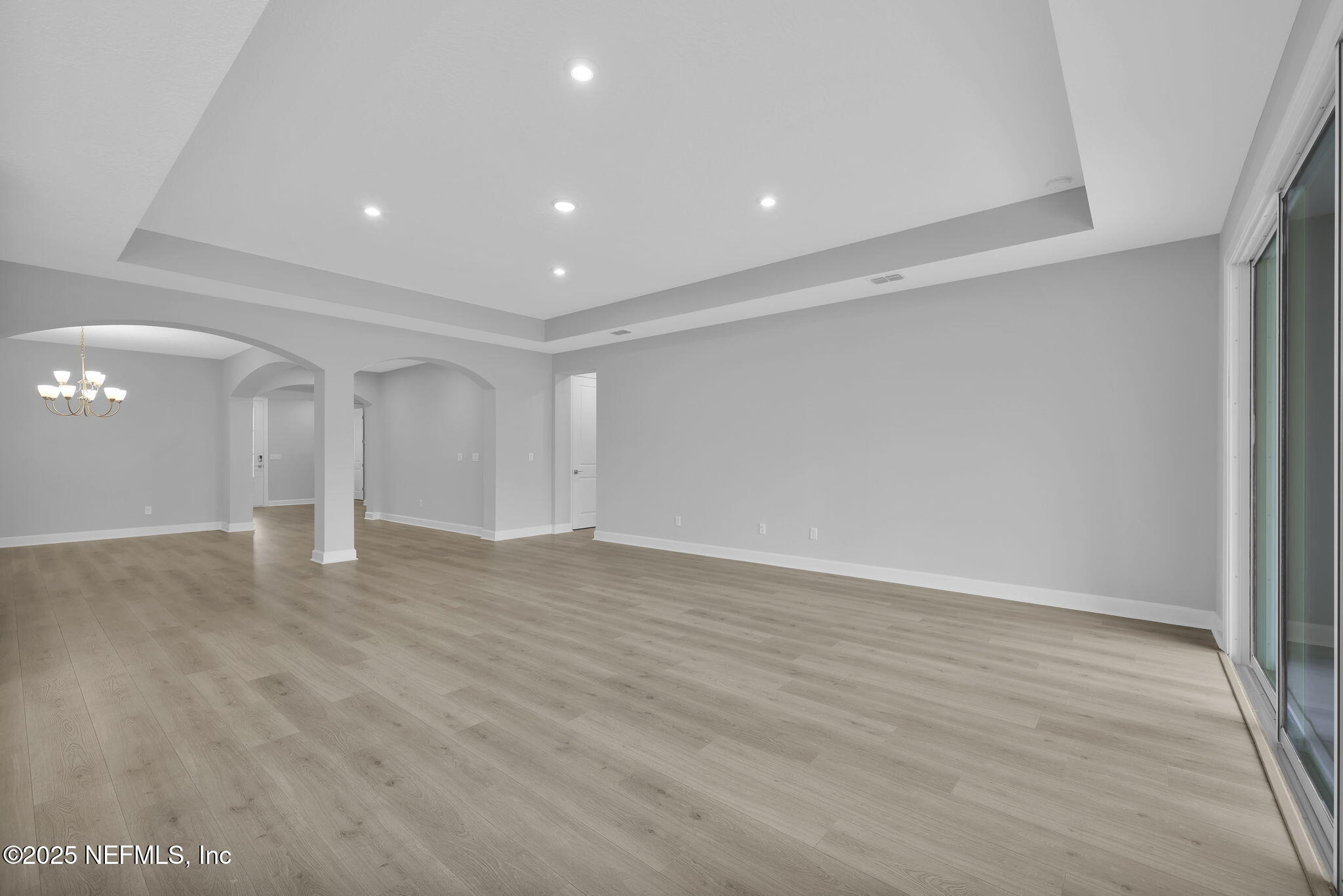 39 Greylock Lane St. Augustine, FL 32092 - Photo 35 of 54 a view of empty room with wooden floor