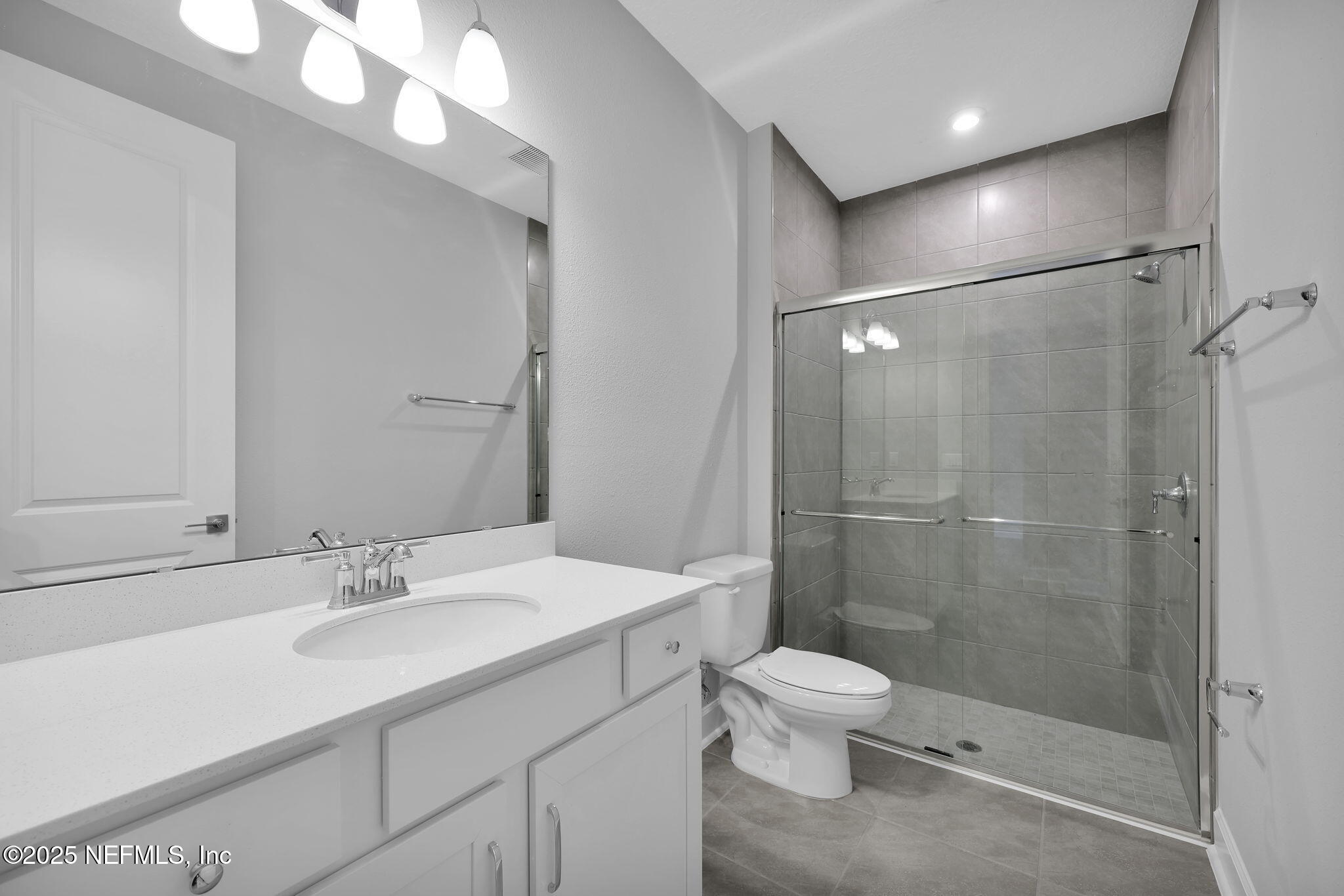 39 Greylock Lane St. Augustine, FL 32092 - Photo 46 of 54 a bathroom with a sink toilet and shower