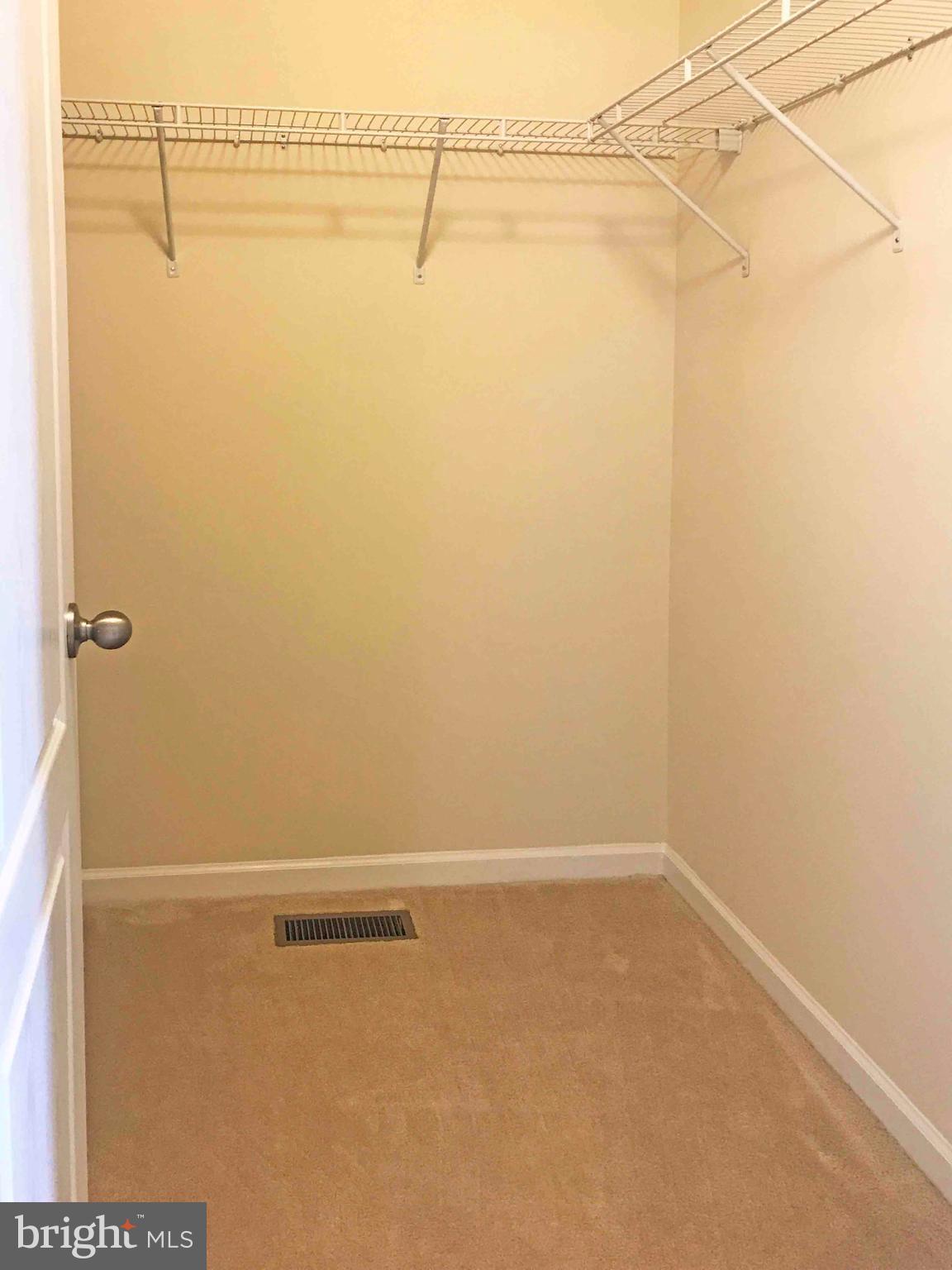 55 Blakely Road Kearneysville, WV 25430 - Photo 13 of 15 a view of a room with racks on the wall