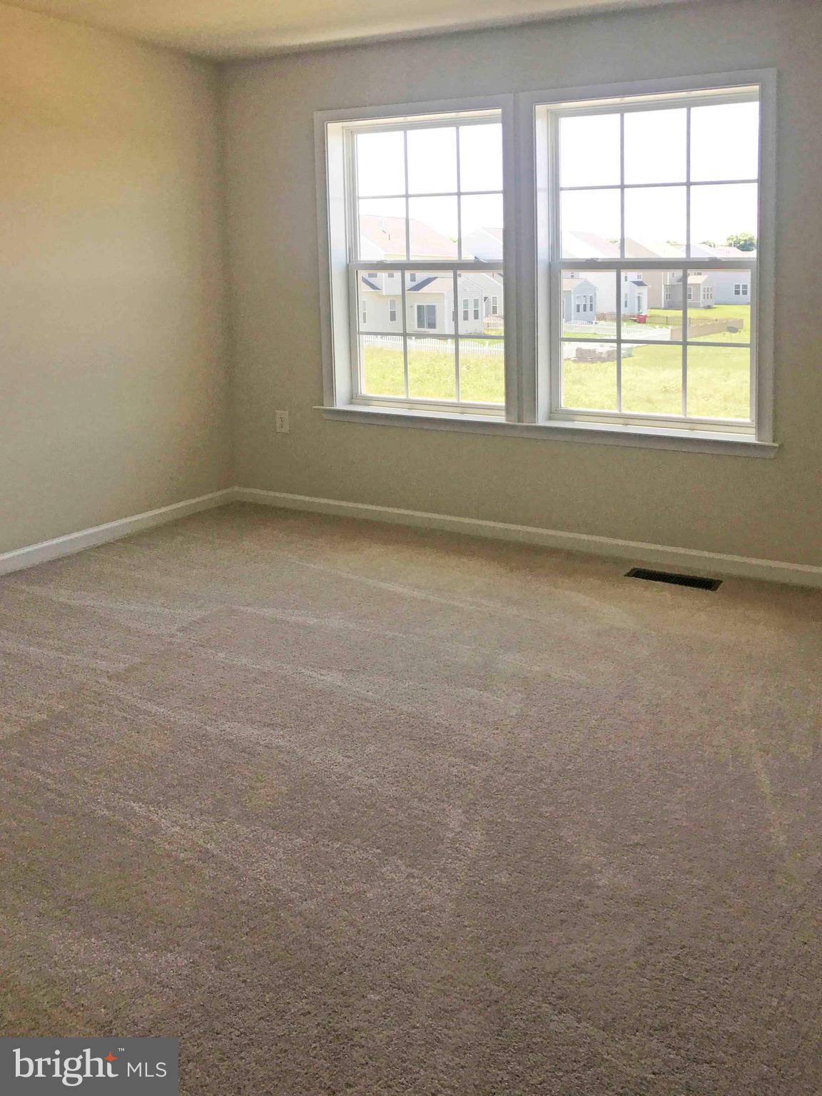 55 Blakely Road Kearneysville, WV 25430 - Photo 14 of 15 an empty room with a window