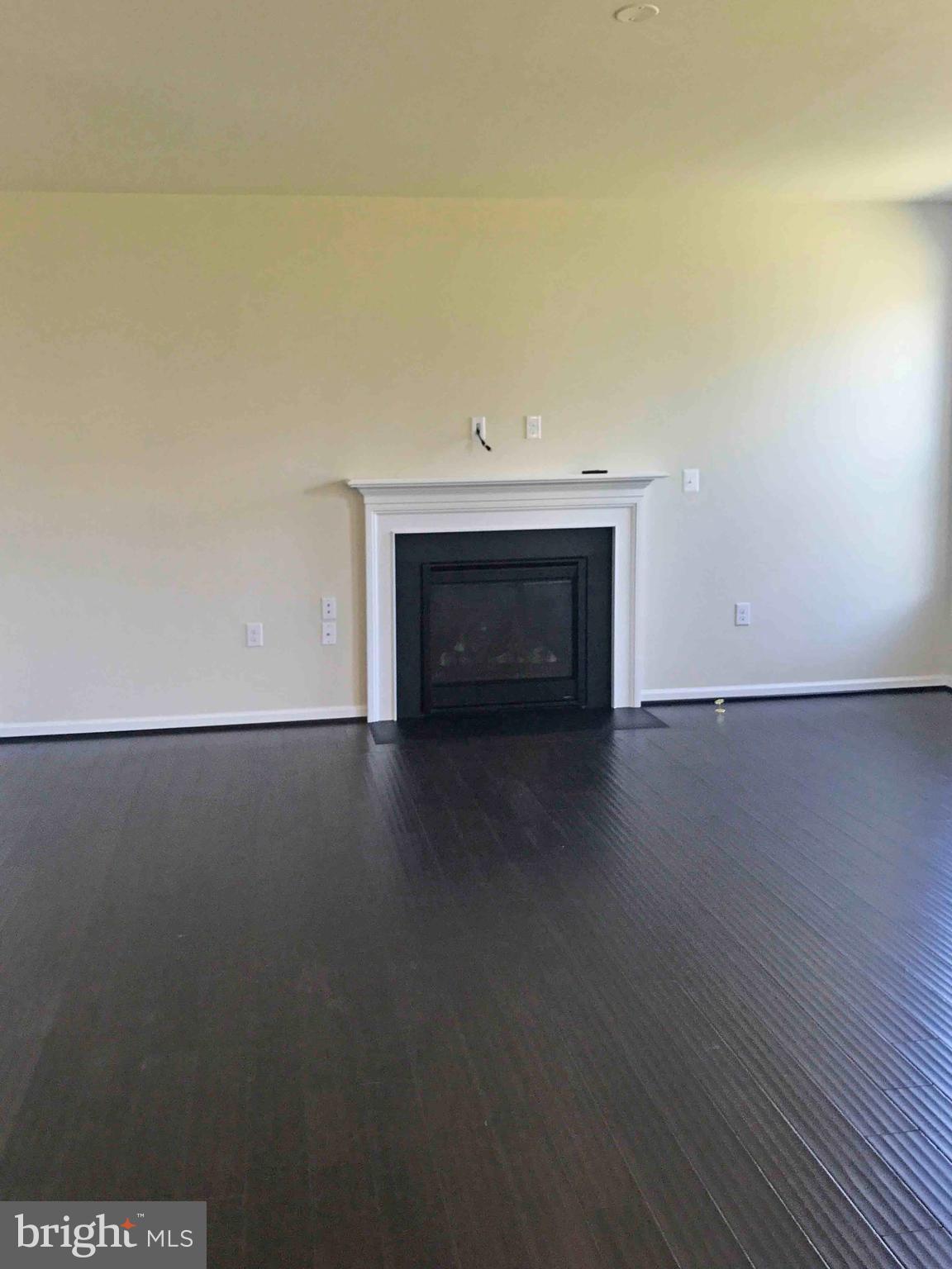 55 Blakely Road Kearneysville, WV 25430 - Photo 6 of 15 a view of a livingroom with a fireplace