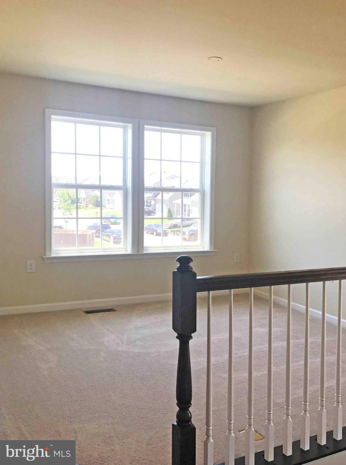 55 Blakely Road Kearneysville, WV 25430 - Photo 7 of 15 a view of staircase with window