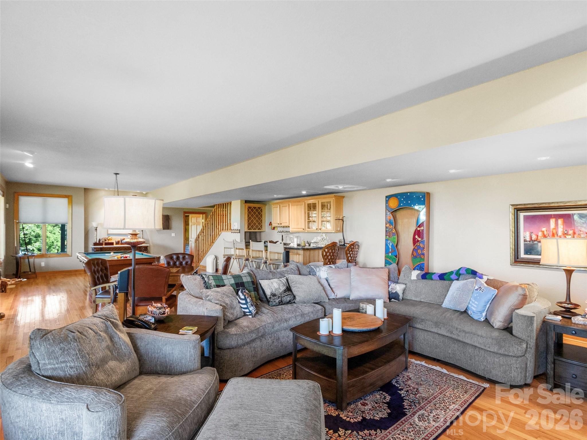 350 Ball Camp Road Burnsville, NC 28714 - Photo 25 of 44 a living room with furniture and a large window