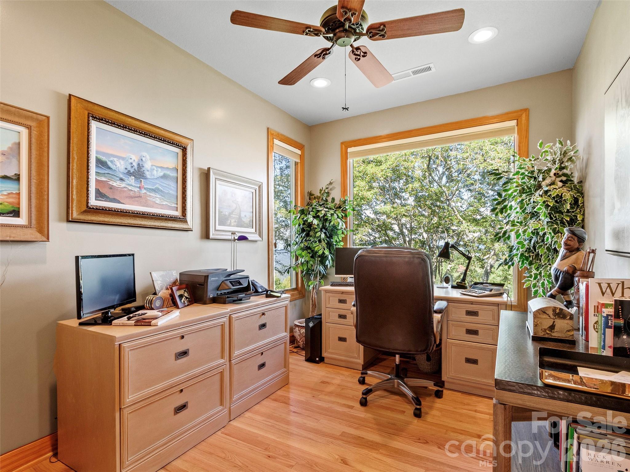 350 Ball Camp Road Burnsville, NC 28714 - Photo 32 of 44 a view of workspace with wooden floor windows