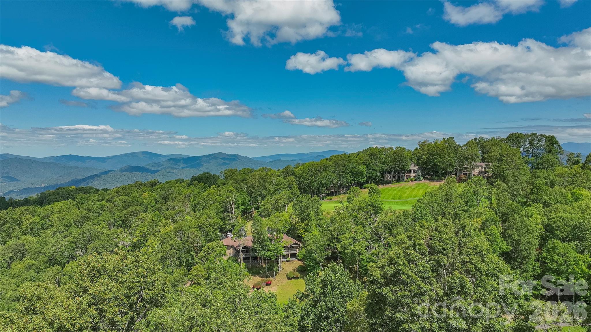 350 Ball Camp Road Burnsville, NC 28714 - Photo 43 of 44 a view of a bunch of trees in the background
