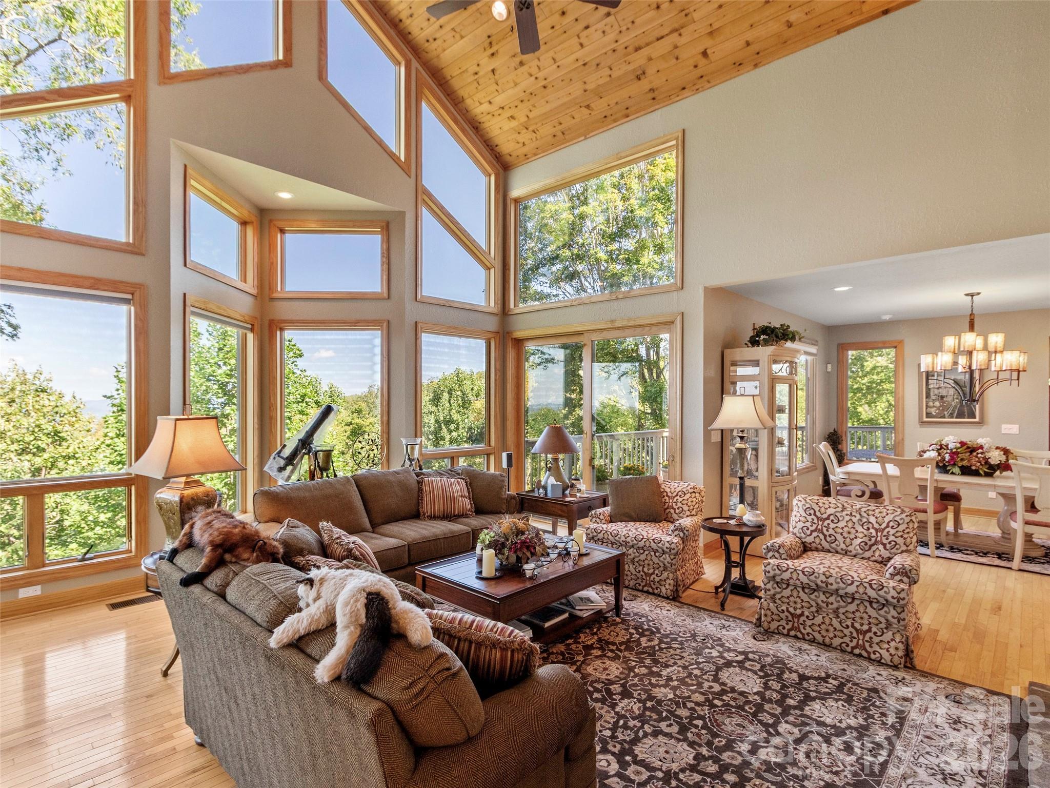 350 Ball Camp Road Burnsville, NC 28714 - Photo 5 of 44 a living room with furniture and a large window