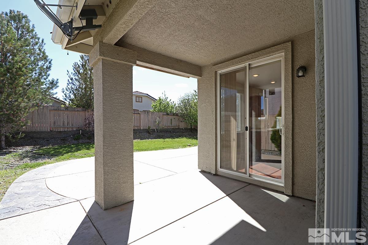 10047 Silver Star Drive Reno, NV 89521 - Photo 19 of 26 a view of a glass door with a porch