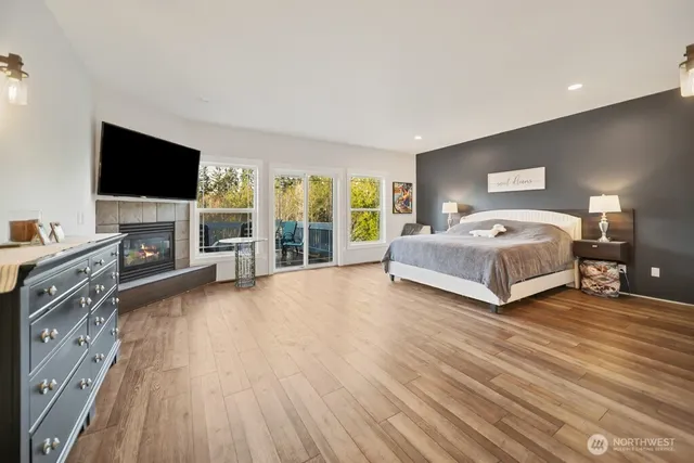 a bathroom with a glass shower door