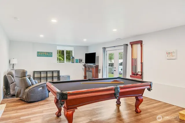 a view of balcony with furniture and umbrella