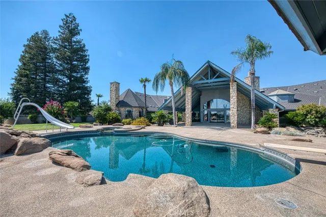 a view of outdoor space yard and swimming pool